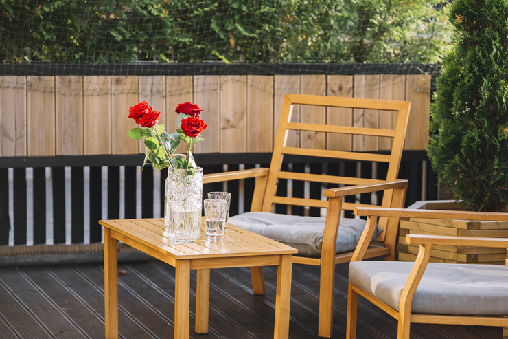Header beautiful red rose vase drink wooden table rooftop