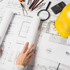 Art thumb crop architect opening blueprint