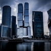 Art thumb low angle shot grey skyscrapers front river dark cloudy sky