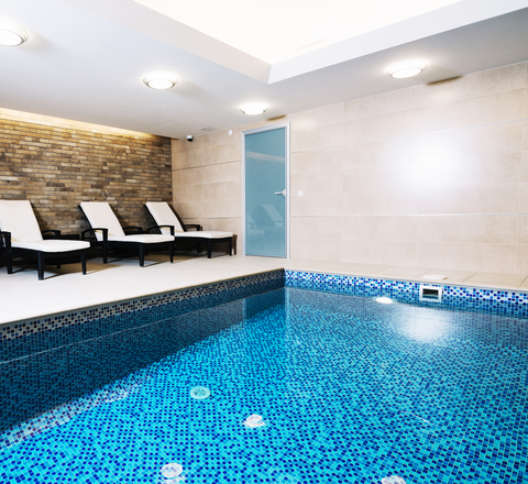 Vertical slider indoor swimming pool